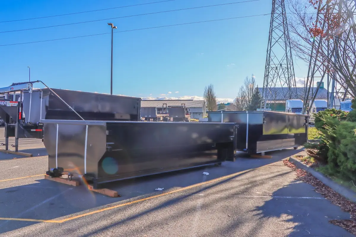 Roll-off dumpster ready for waste disposal at job site for Construction Dumpster Rental in Maywood